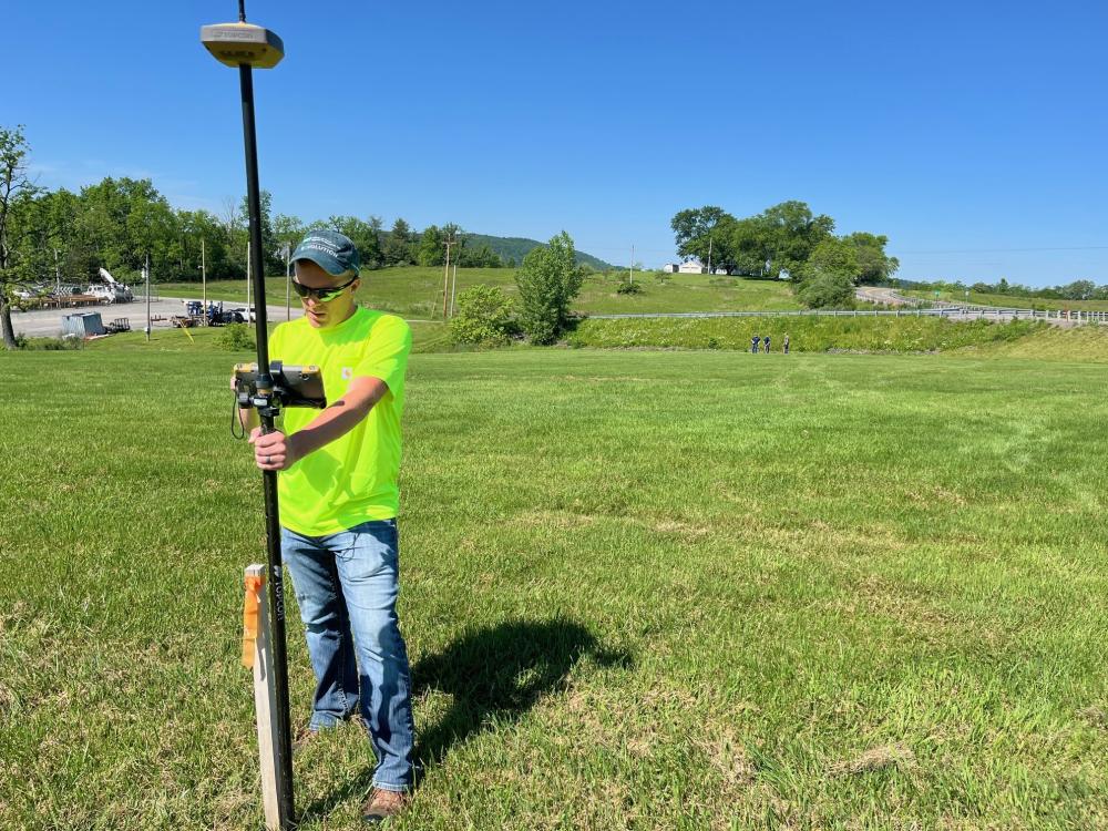 Brennan using staking tools.